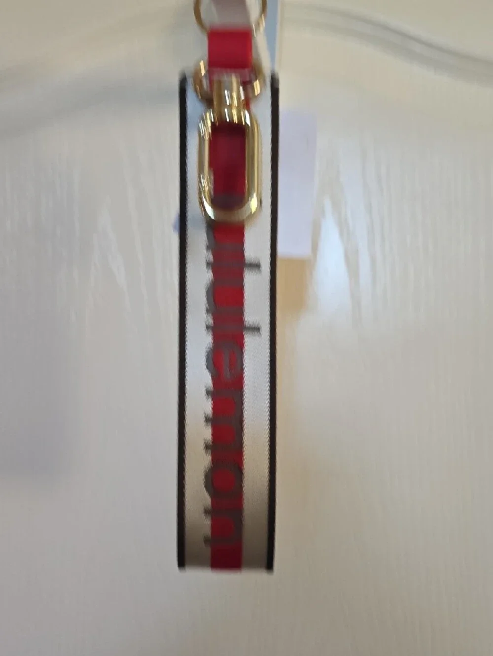Lululemon Never lost kate chain word mark